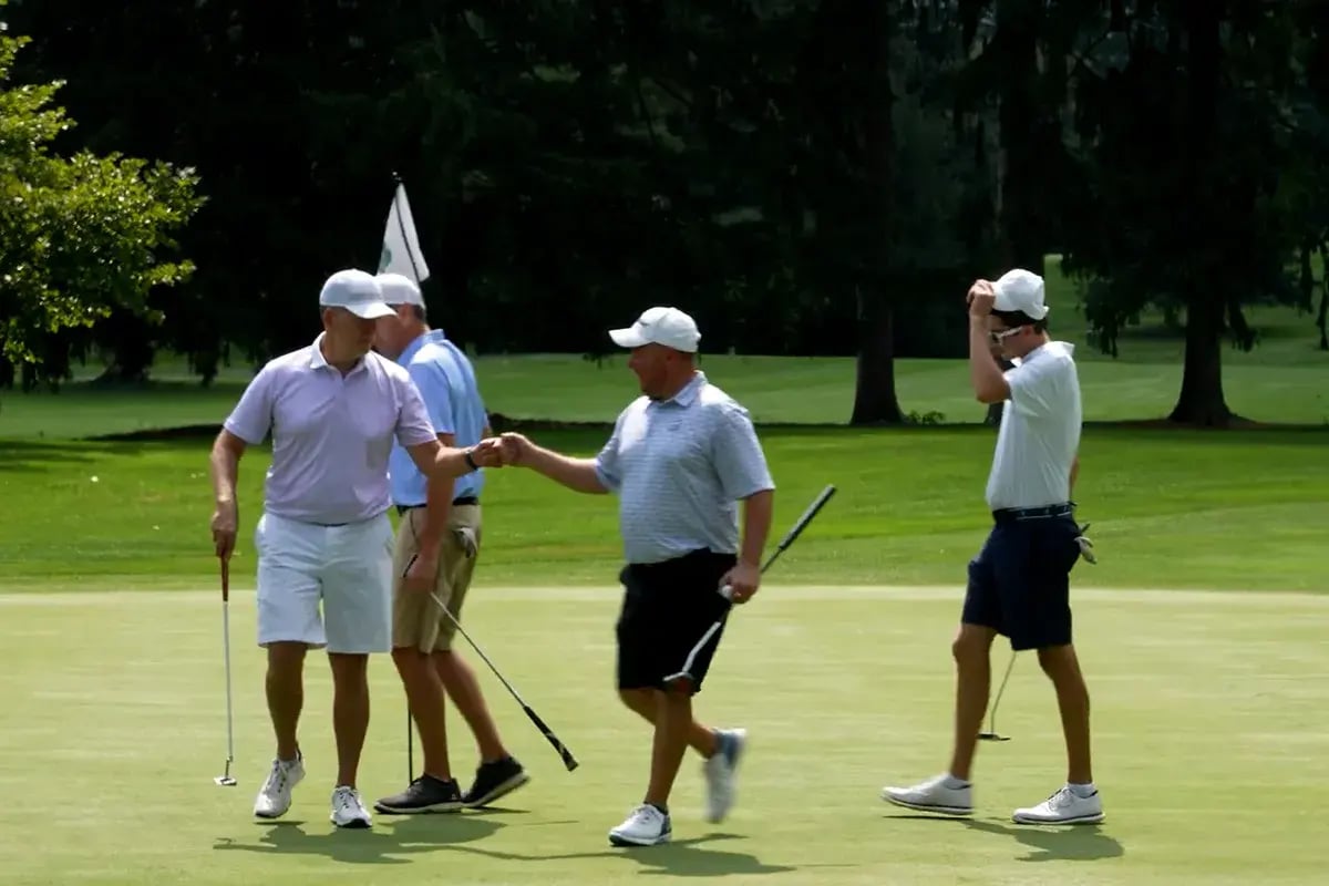 fist bump golfers