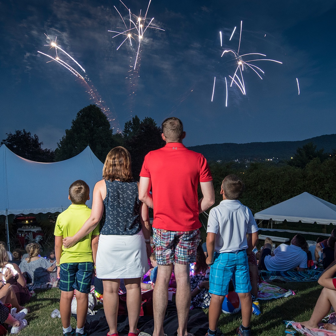 family watching fireworks on 4th of July at Brookside Country Club